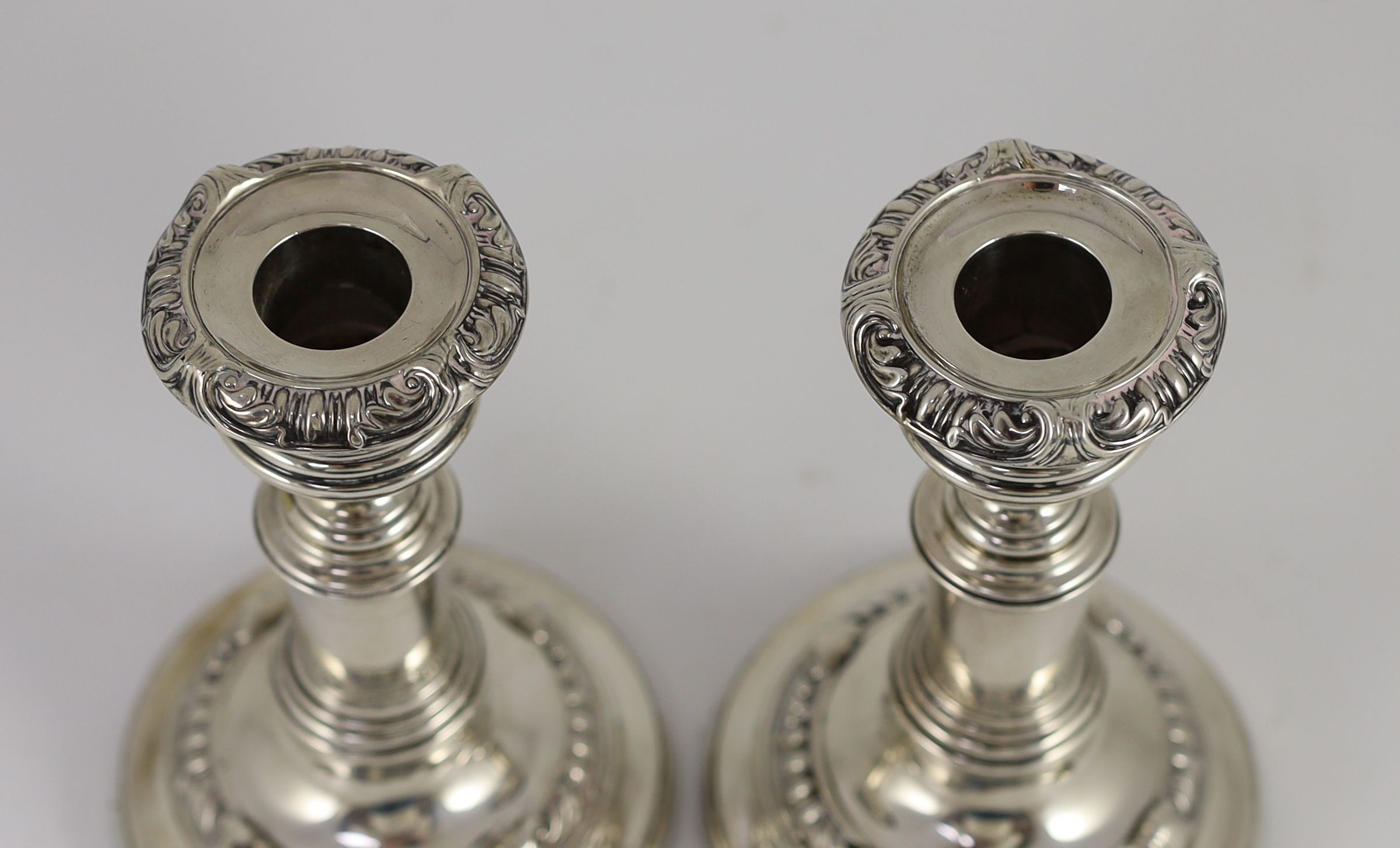 A pair of George III silver telescopic candlesticks, by S.C. Younge & Co
